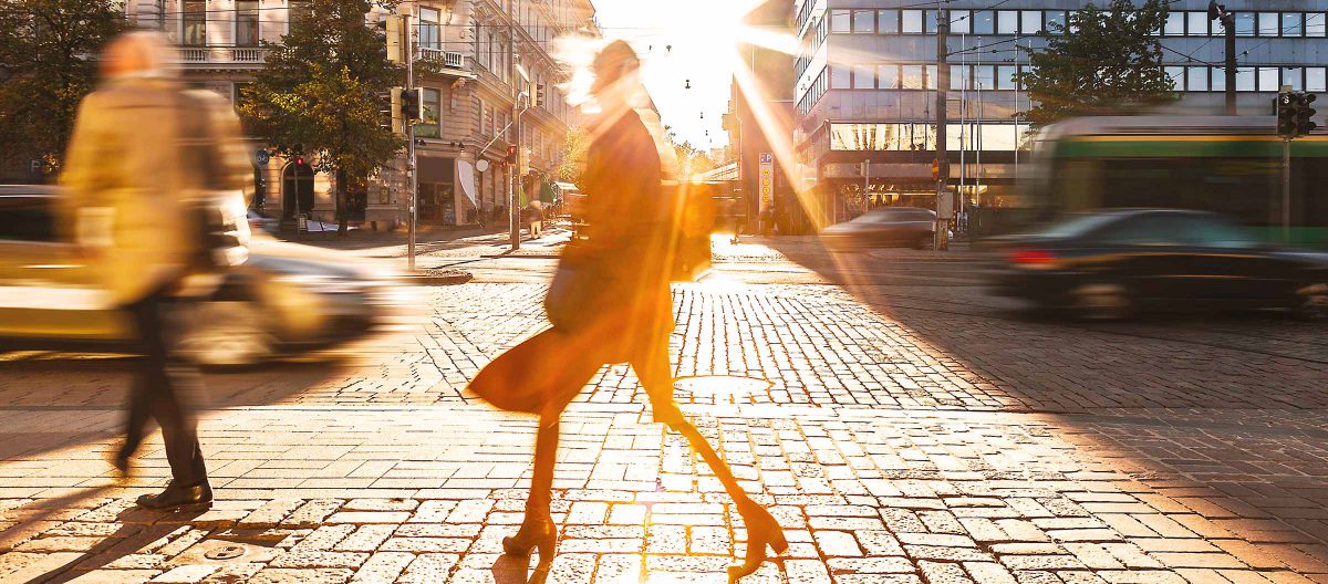 Improve Your Business With People Counting People walking on a cobbled stone street